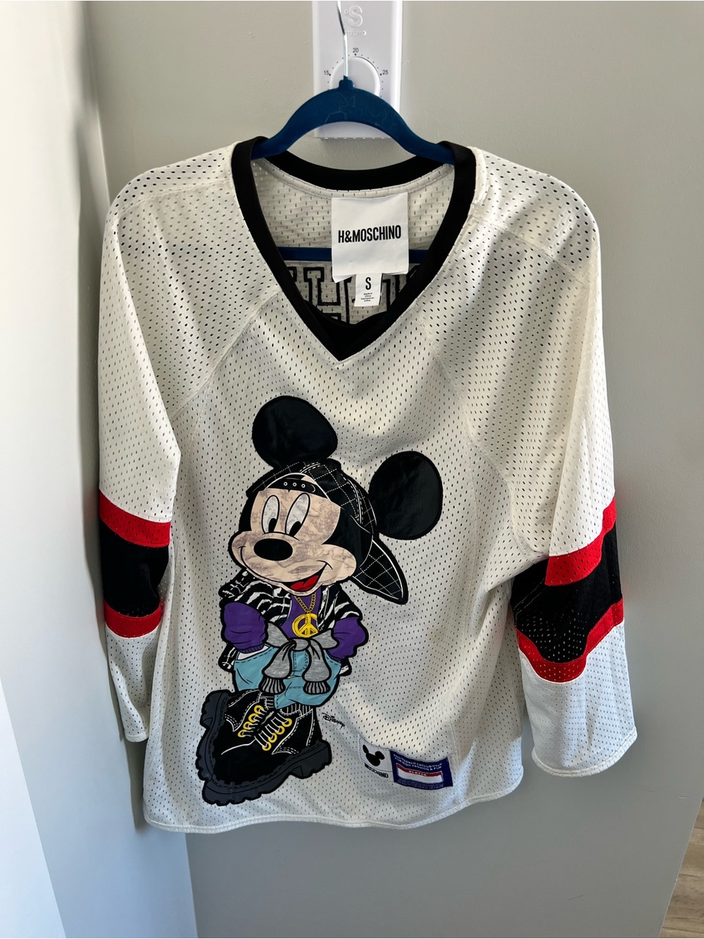 Moschino & HM White Jersey Top fit oversized . Has some stains/spots